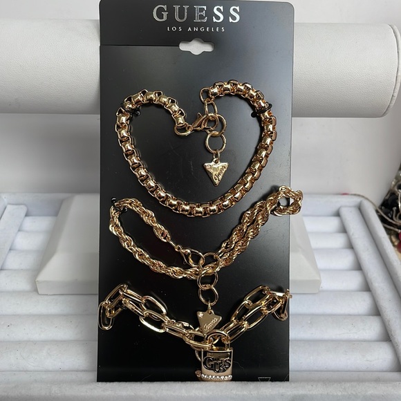 Guess Pack of 3 Gold Tone Bracelets. - Picture 1 of 6